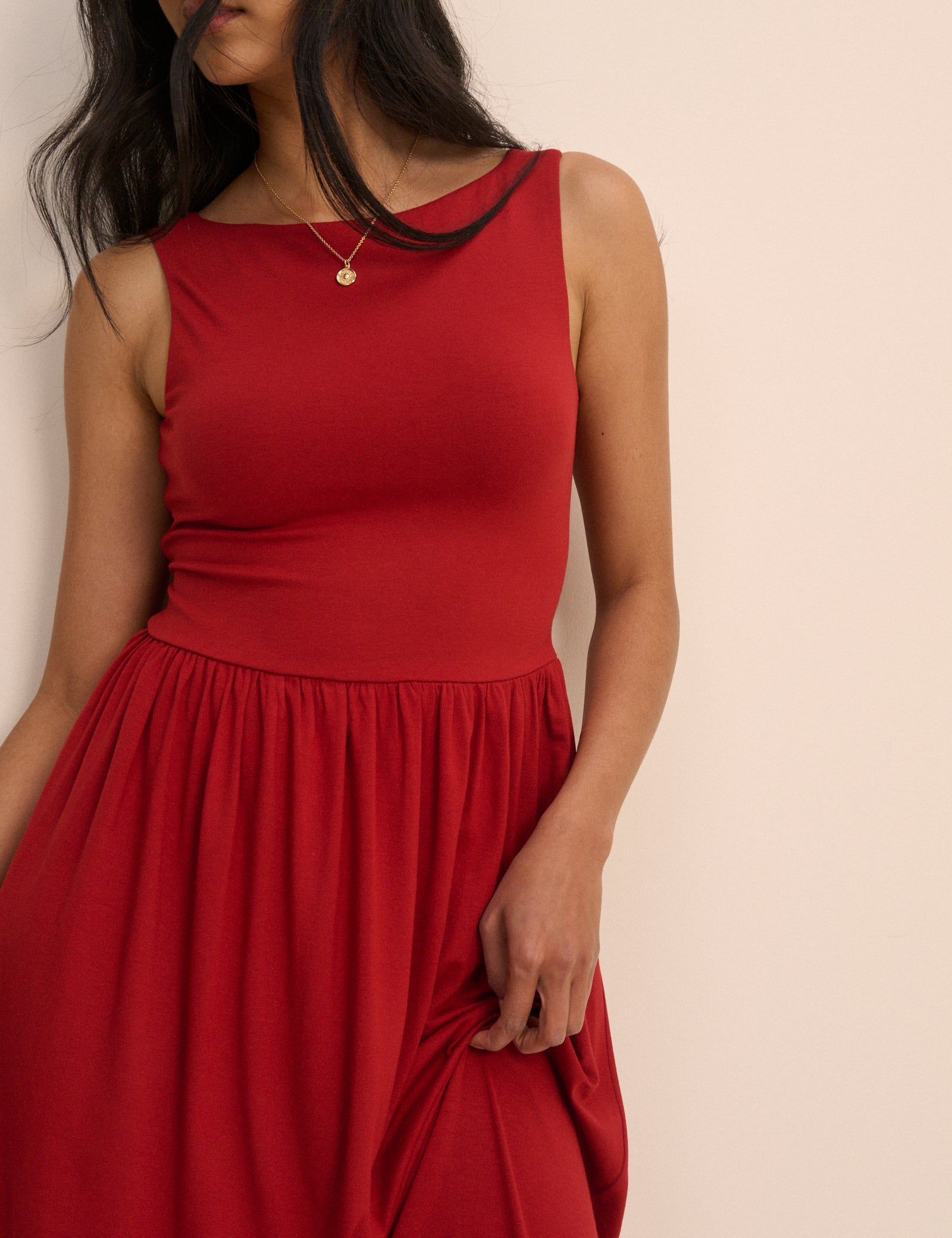 red dress without sleeves Crimson Ball Gown Teuta Matoshi